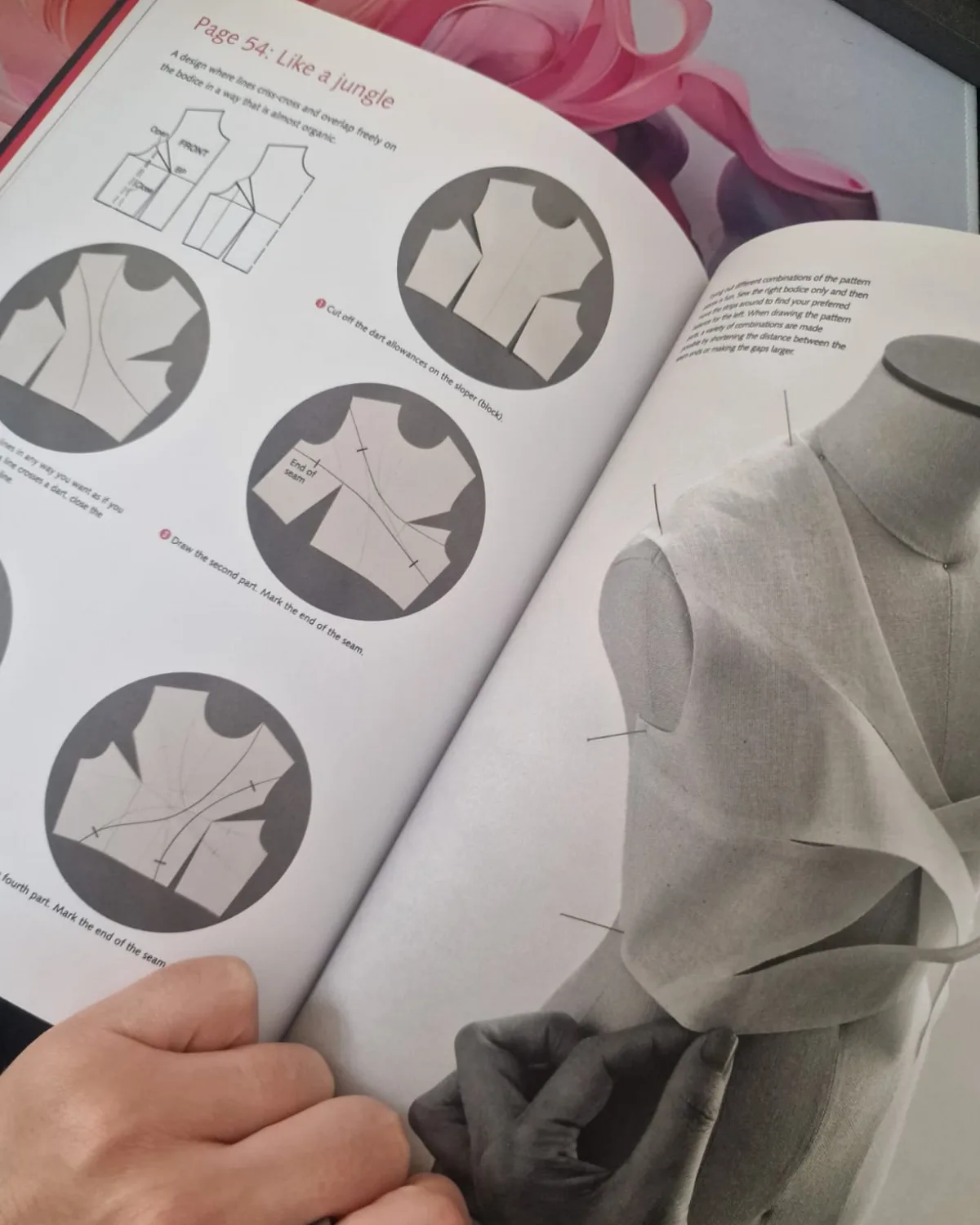 An open fashionINSTA book showcases detailed pattern making diagrams for a "Like a jungle" bodice design, while a hand skillfully drapes fabric on a mannequin, demonstrating the pattern magic process.