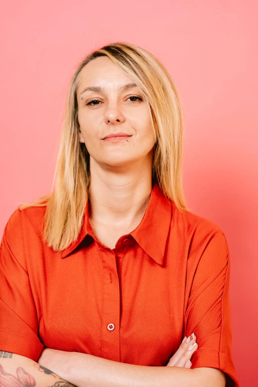 Woman Working with Fashion AI Tool Displayed on Computer Monitor